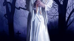 Gothic woman blood cemetery crying