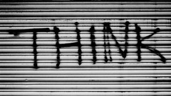 Graffiti lines motivation Manchester think grayscale storefronts
