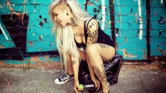 Graffiti woman blondes tattoos smiling cleavage Sara Fabel
