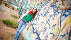 Graffiti woman jeans jackets outdoors redheads high heels Ariel 