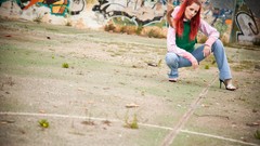 Graffiti woman jeans jackets outdoors redheads high heels Ariel 