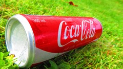 Grass coca-cola coke soda cans