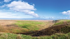 Grass hills panorama Seaside sunny