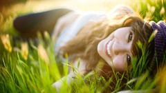 Grass summer woman smiling brown eyes brunettes