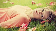 Grass woman blondes blue eyes lying down
