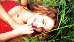 Grass woman Drew Barrymore Actress laughing lying down