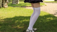 Grass woman legs stockings skirts miniskirts white stockings 