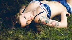 Grass woman tattoos lingerie bra lying down panties necklaces