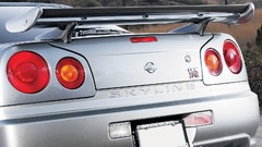 Gray cars close-up Nissan back view vehicles Nissan Skyline 