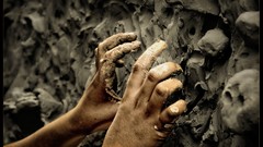 Gray hands mold mud crawling