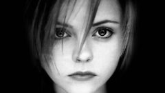 Grayscale faces black background