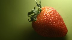 Green background strawberries fruits Simple Background