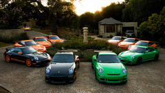 Green black Porsche cars