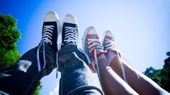 Green Converse skyscapes legs up