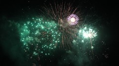 Green fireworks night sky