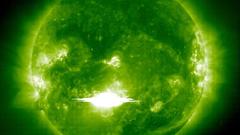 Green sun flash outburst
