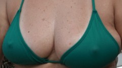 Green woman freckles cleavage bikini