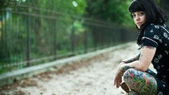 Green woman outdoors tattoos brunettes black dress