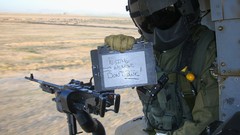 Guns Helicopters signs vehicles