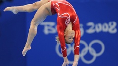 Gymnast arms raised