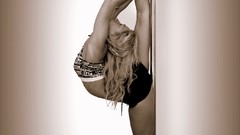 Gymnastics Split blondes pole fitness flexible woman pole 