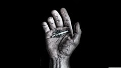 Hands black background monochrome smoking