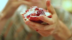 Hands fruits pomegranate