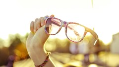 Hands glasses sunlight