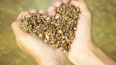 Hands stones Hearts pebbles