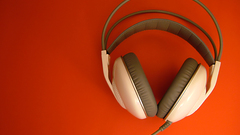 Headphones orange background Music