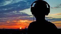 Headphones sunset silhouettes blurred