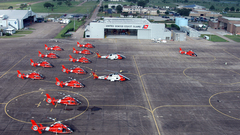 Helicopters coast guard vehicles