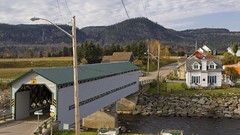 Houses quebec fjord covered bridge