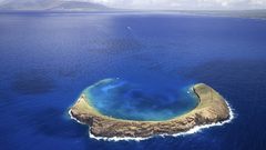 Island blue ocean clouds