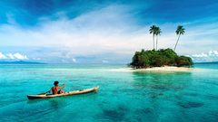 Islands palm trees canoe