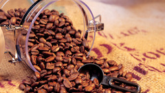 Jar coffee beans spilled