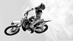 Jump black and white motorbikes