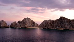 landscape rock clouds water