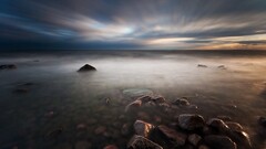 landscape water sky stones rock clouds horizon nature