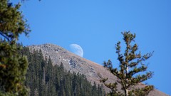Landscapes clouds hills moon rise new mexico ski blue skies 