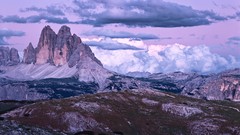 Landscapes nature grass Mountains clouds dark white Green rocks 