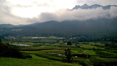 Landscapes nature Mountains clouds Green fields