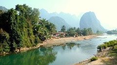 Landscapes nature tropics Asia palm trees huts laos