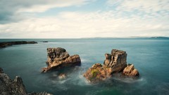 Landscapes nature water blue clouds hills white Islands rocks 