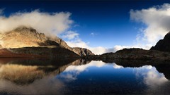Landscapes nature water blue Mountains clouds white calm brown 