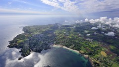 Landscapes Sea nature water clouds land coast houses fields 