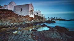 Landscapes Sea stones ocean coast rocks buildings churches 
