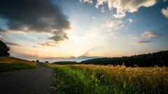 Landscapes sunrise Rays clouds Green orange switzerland fields 