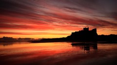 Landscapes sunset coast silhouettes Castles bamburgh castle