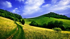 Landscapes sunset nature grass sun Mountains clouds fields 